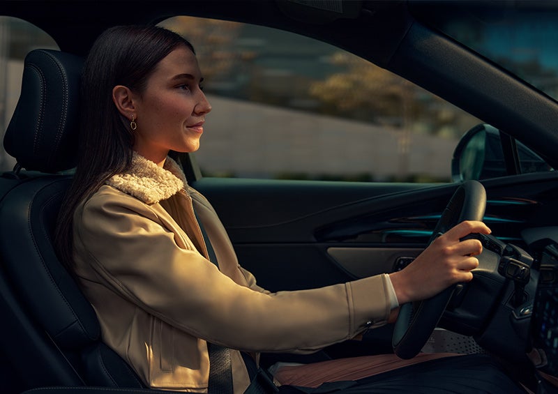 A woman driving the All-new 2024 Lincoln Nautilus® SUV